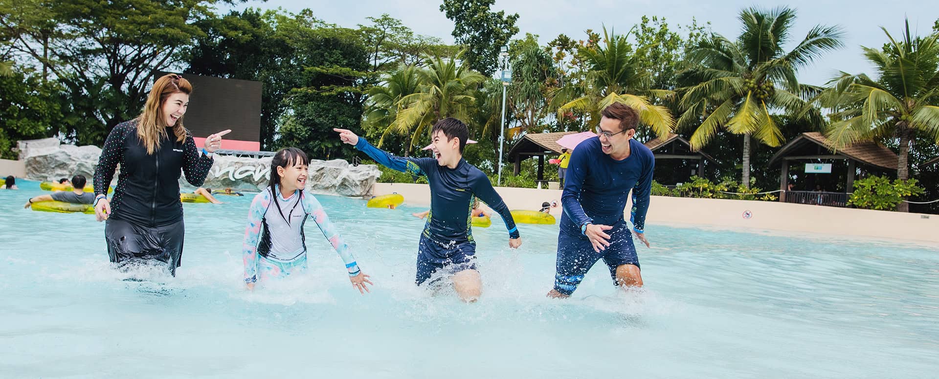 A family having fun at the Vana Nava waterpark in Hua Hin